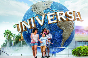 family walking in front of universal orlando globe
